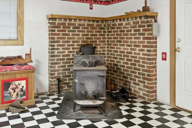a bathroom with a sink a toilet and a shower