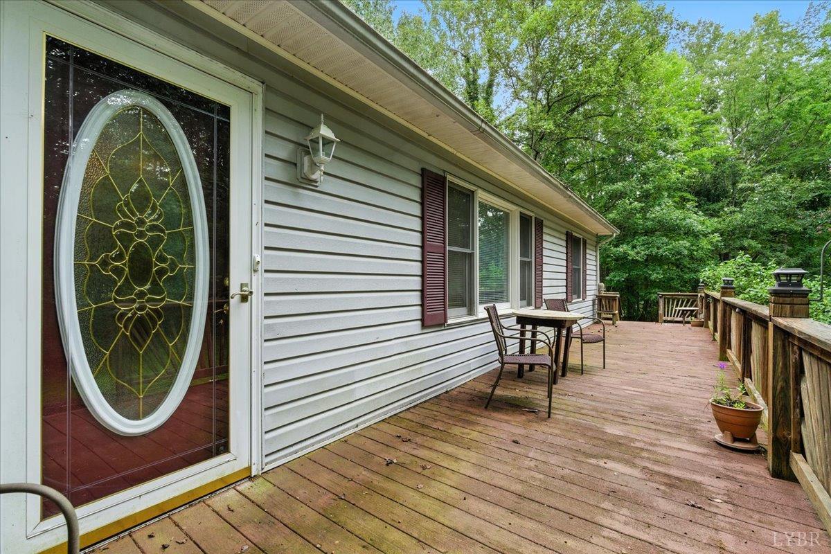 2926 Forbes Mill Road Bedford, VA 24523 - Photo 4 of 36 a view of a two chairs in the balcony
