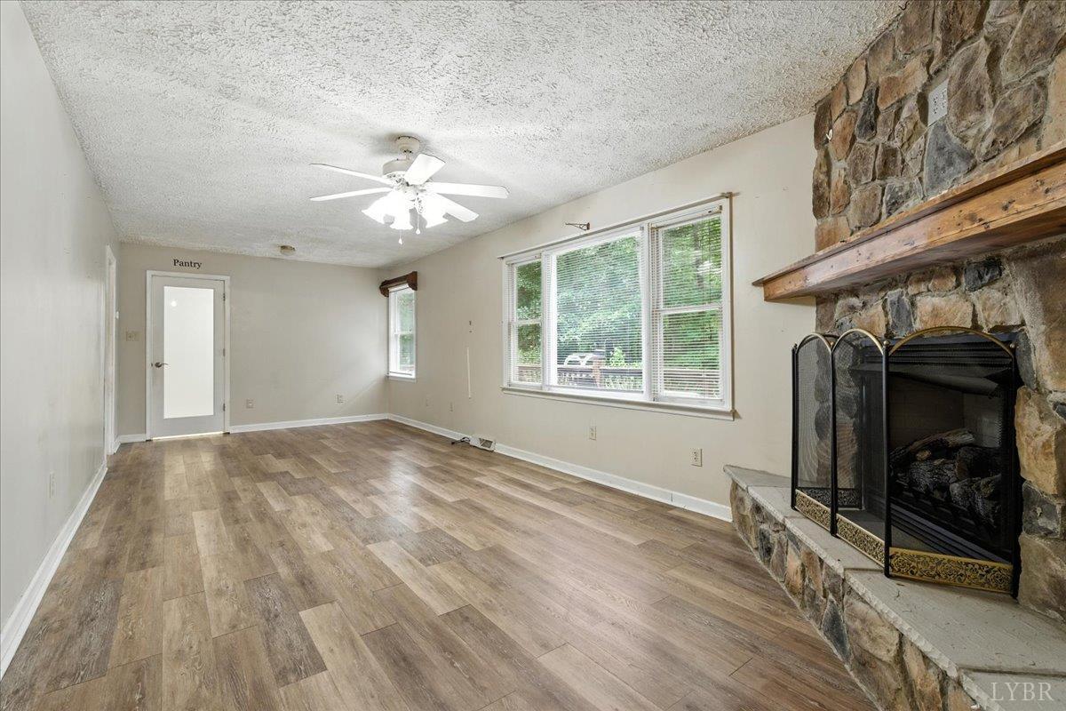 2926 Forbes Mill Road Bedford, VA 24523 - Photo 5 of 36 a view of empty room with window and fireplace