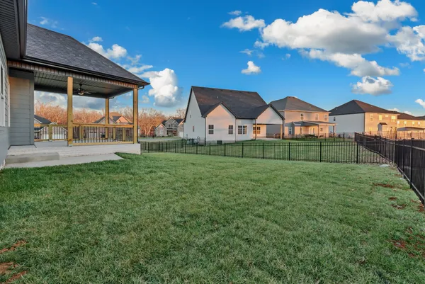 a view of a house with a big yard