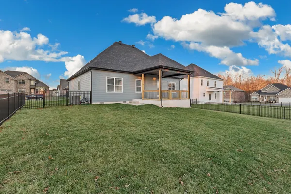a view of a house with a big yard
