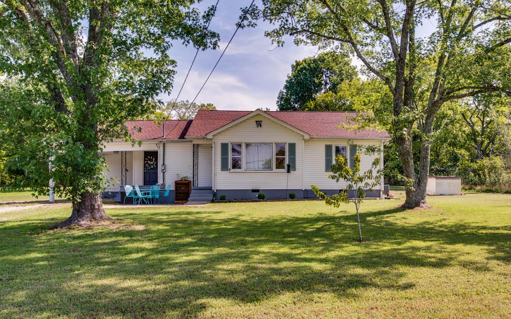 4467 Kedron Road Spring Hill, TN 37174 - Photo 1 of 14 a front view of a house with swimming pool having outdoor seating