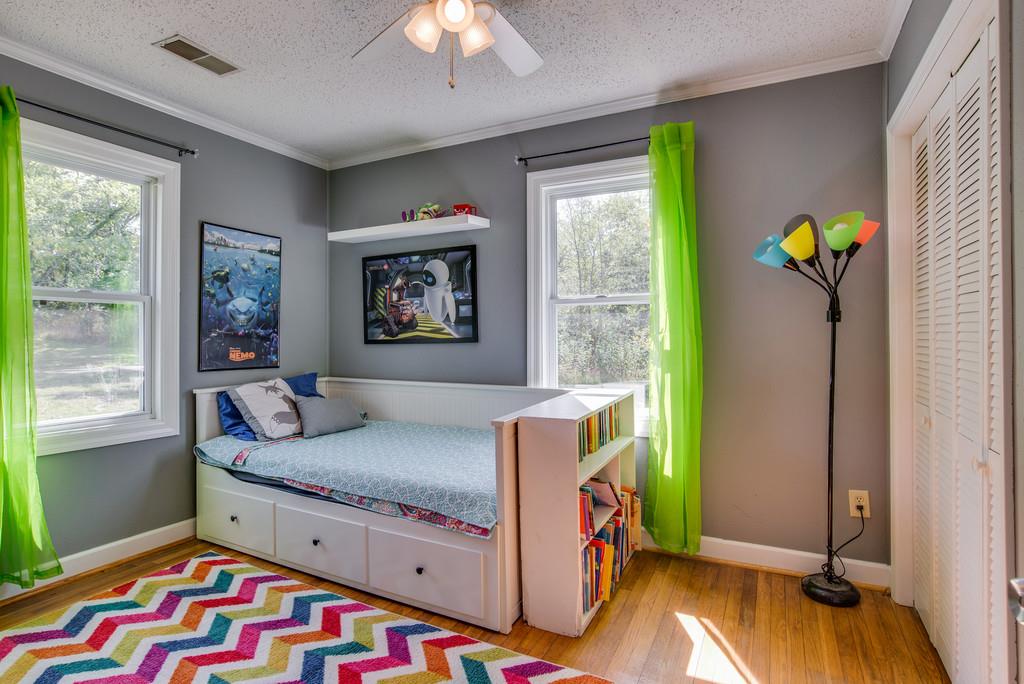 4467 Kedron Road Spring Hill, TN 37174 - Photo 8 of 14 a bedroom with a bed and a window