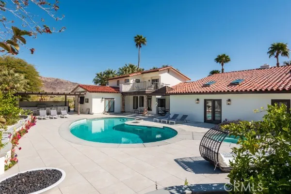 a front view of house with outdoor seating space