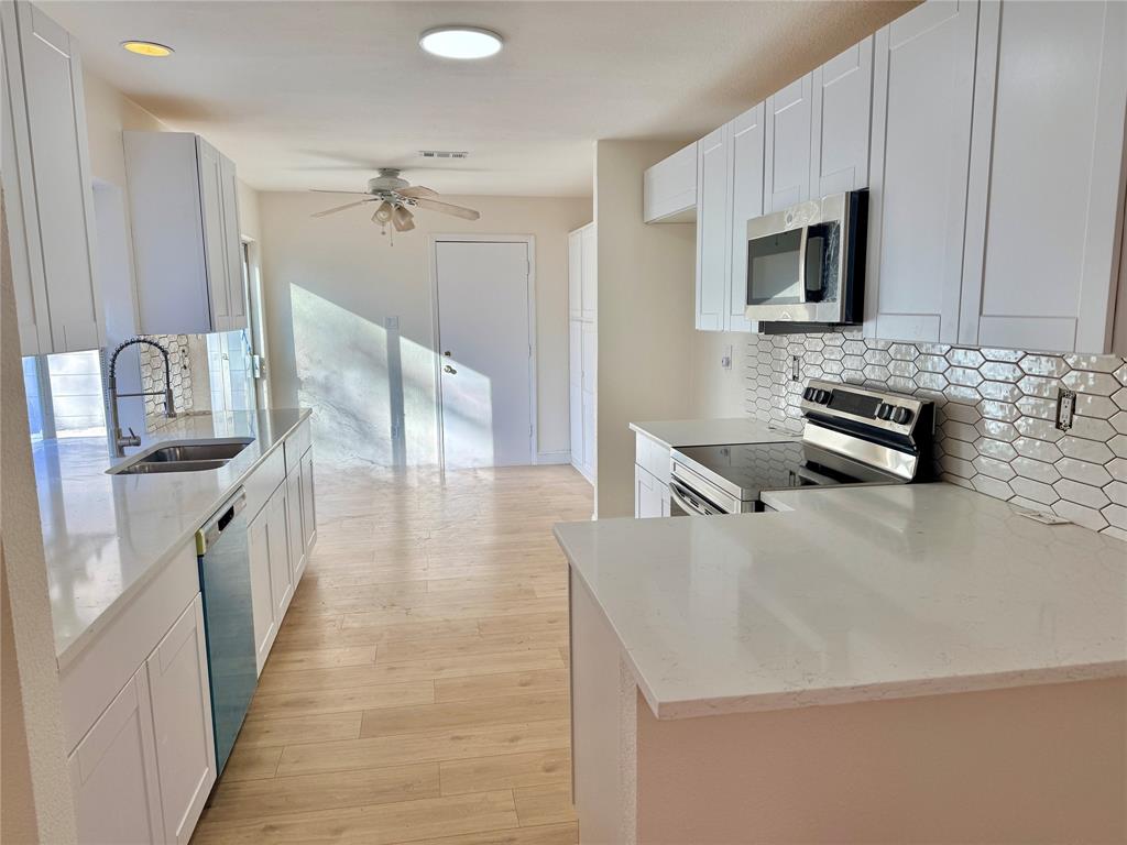 4243 Timberglen Road Dallas, TX 75287 - Photo 5 of 7 bar area, new cabinets and counters