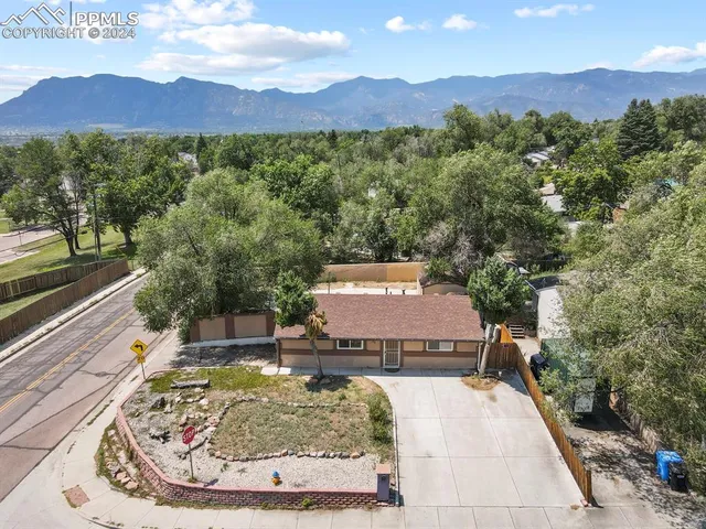 an aerial view of a city with lots of residential buildings