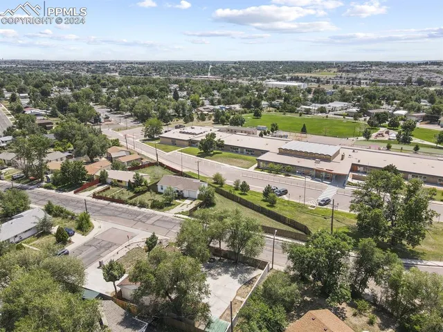 a view of a city with mountain