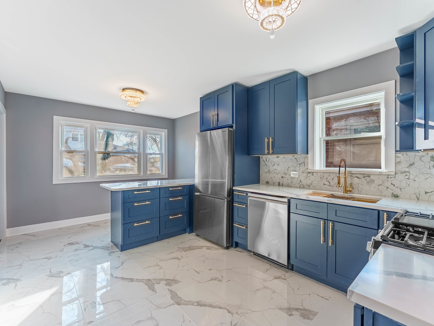3053 West 77th Street Chicago, IL 60652 - Photo 10 of 23 a kitchen with stainless steel appliances granite countertop a stove a sink dishwasher and a refrigerator with wooden cabinets