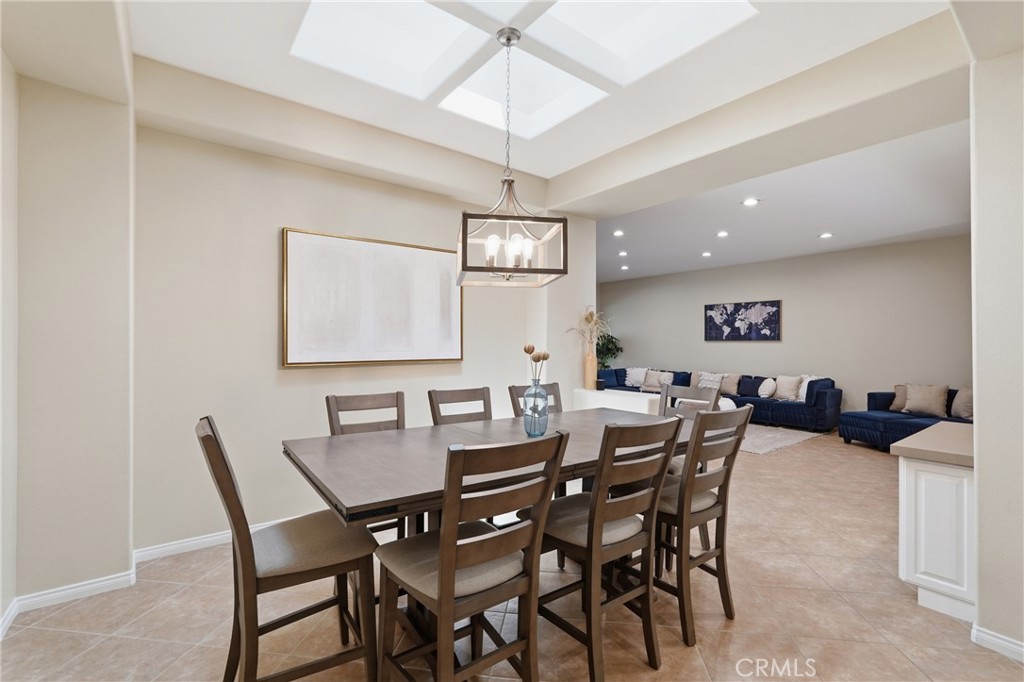 9 Orleans Road Rancho Mirage, CA 92270 - Photo 26 of 71 a view of a dining room with furniture