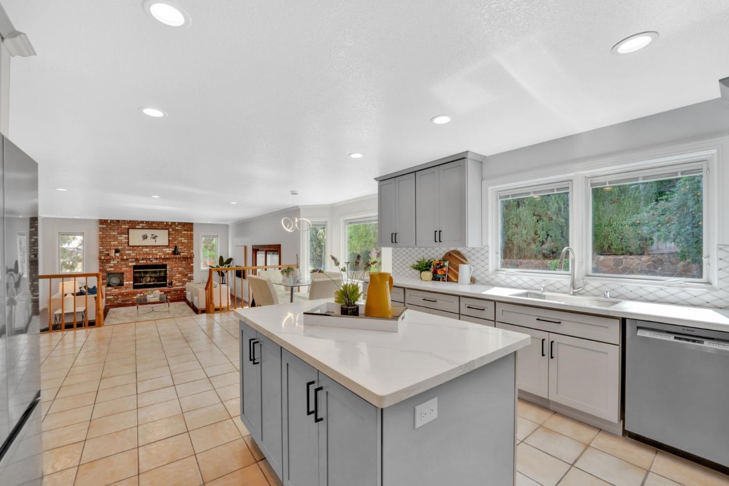 46950 Zapotec Drive Fremont, CA 94539 - Photo 13 of 40 a kitchen with counter top space and living room