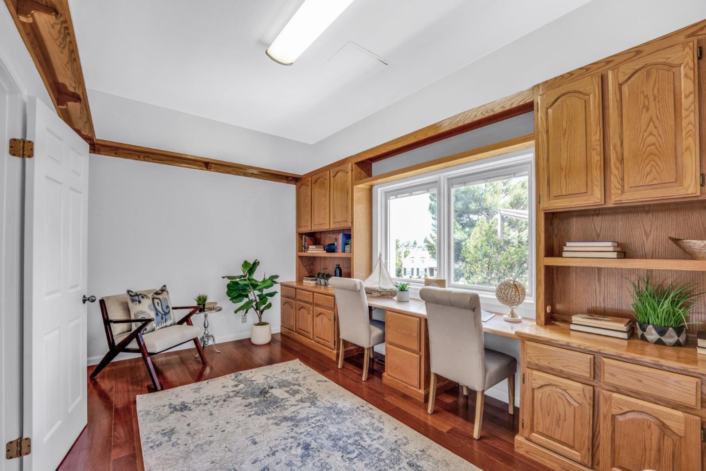 46950 Zapotec Drive Fremont, CA 94539 - Photo 19 of 40 a living room with furniture a window and a potted plant