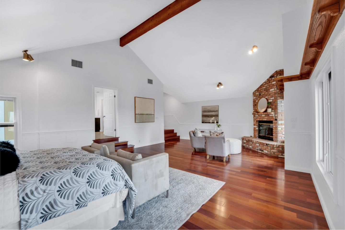 46950 Zapotec Drive Fremont, CA 94539 - Photo 25 of 40 a bedroom with wooden floor and furniture