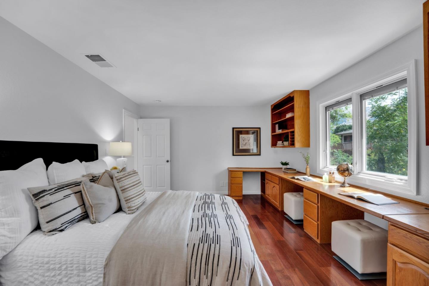 46950 Zapotec Drive Fremont, CA 94539 - Photo 29 of 40 a large bedroom with a bed and a large window