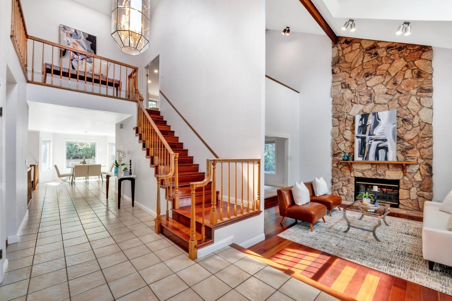 46950 Zapotec Drive Fremont, CA 94539 - Photo 8 of 40 a living room with fireplace furniture and a rug