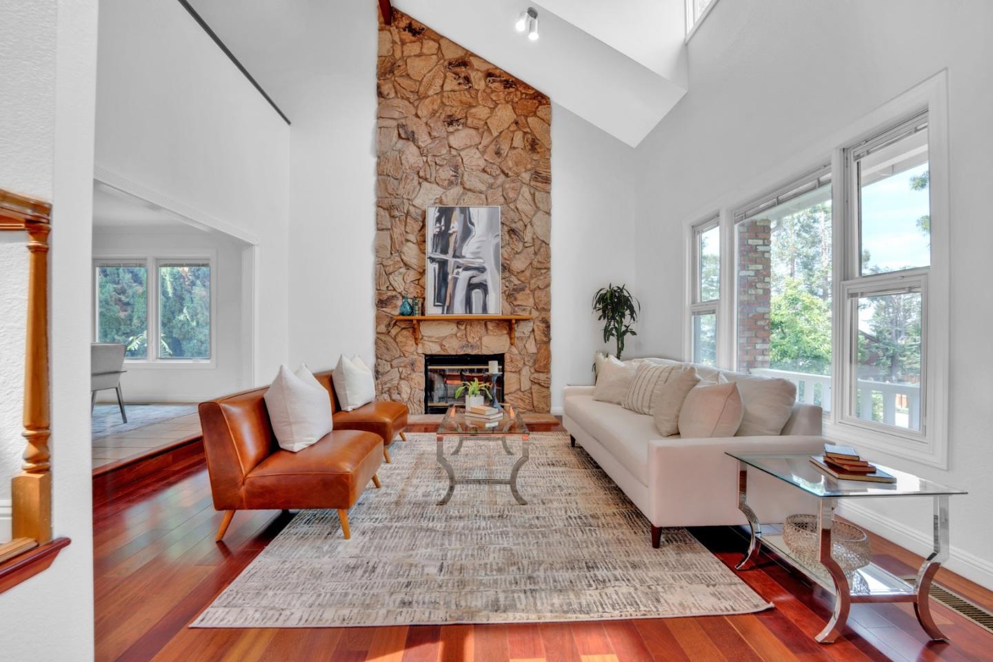 46950 Zapotec Drive Fremont, CA 94539 - Photo 9 of 40 a living room with furniture a rug and a fireplace