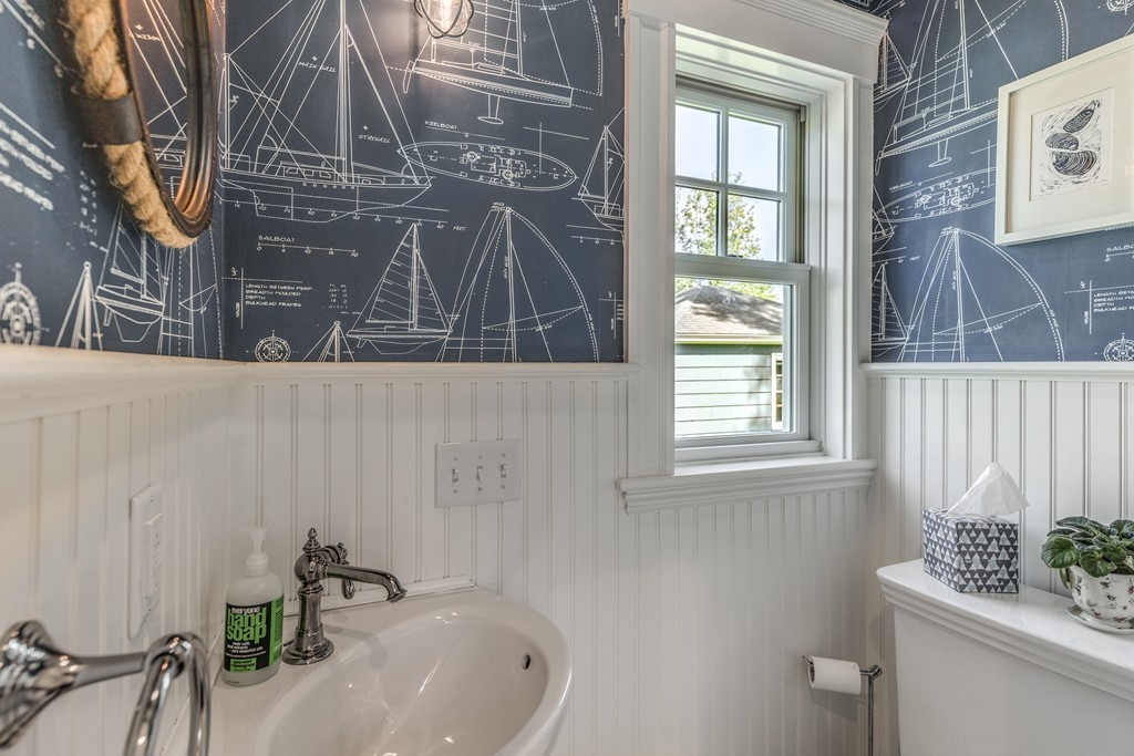 16 Marion Road Marblehead, MA 01945 - Photo 20 of 30 a bathroom with a sink and a window