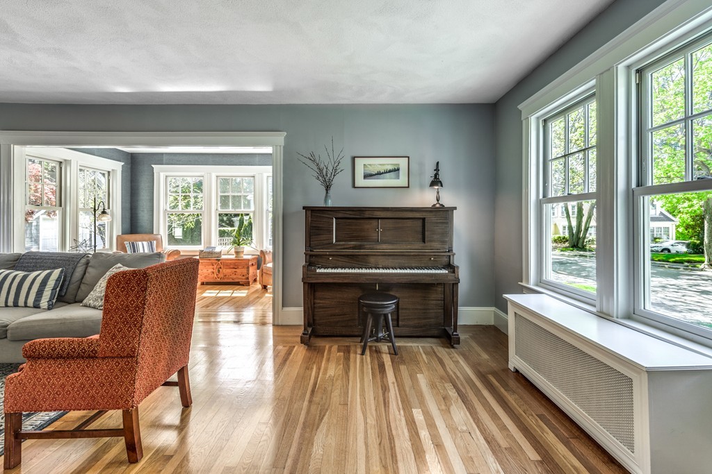 16 Marion Road Marblehead, MA 01945 - Photo 4 of 30 a living room with furniture and a fireplace