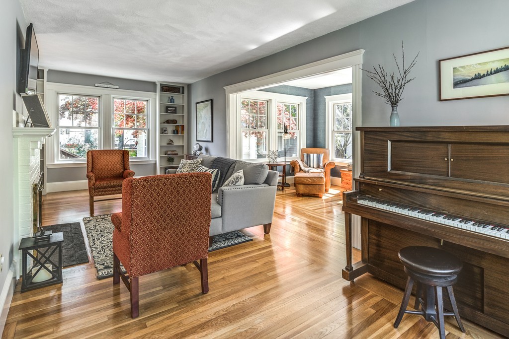 16 Marion Road Marblehead, MA 01945 - Photo 5 of 30 a living room with fireplace furniture and a large window