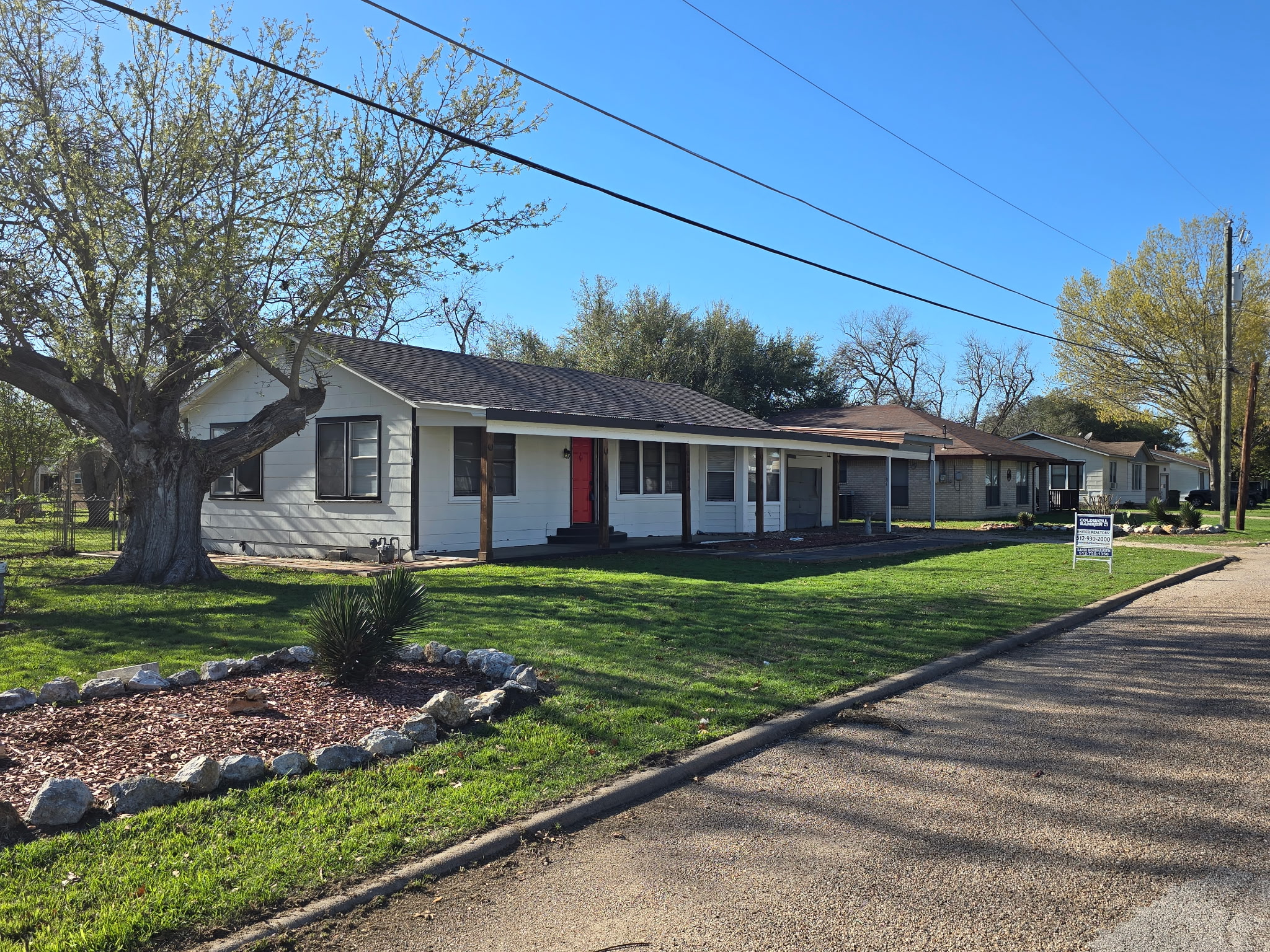305 North 5th Street Thorndale, TX 76577 - Photo 1 of 20 a view of a house with a yard