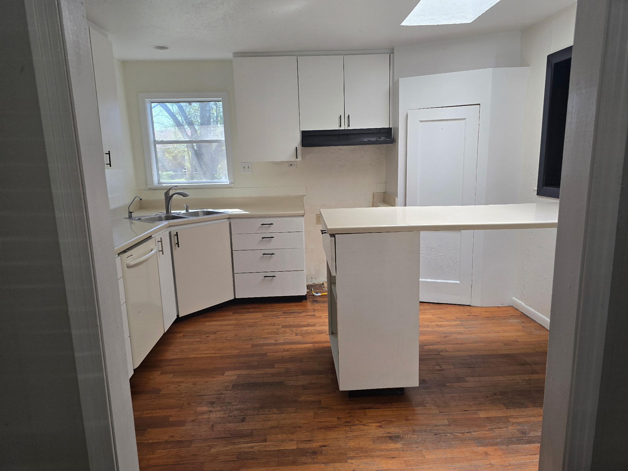 305 North 5th Street Thorndale, TX 76577 - Photo 12 of 20 a room with cabinets and a wooden floor
