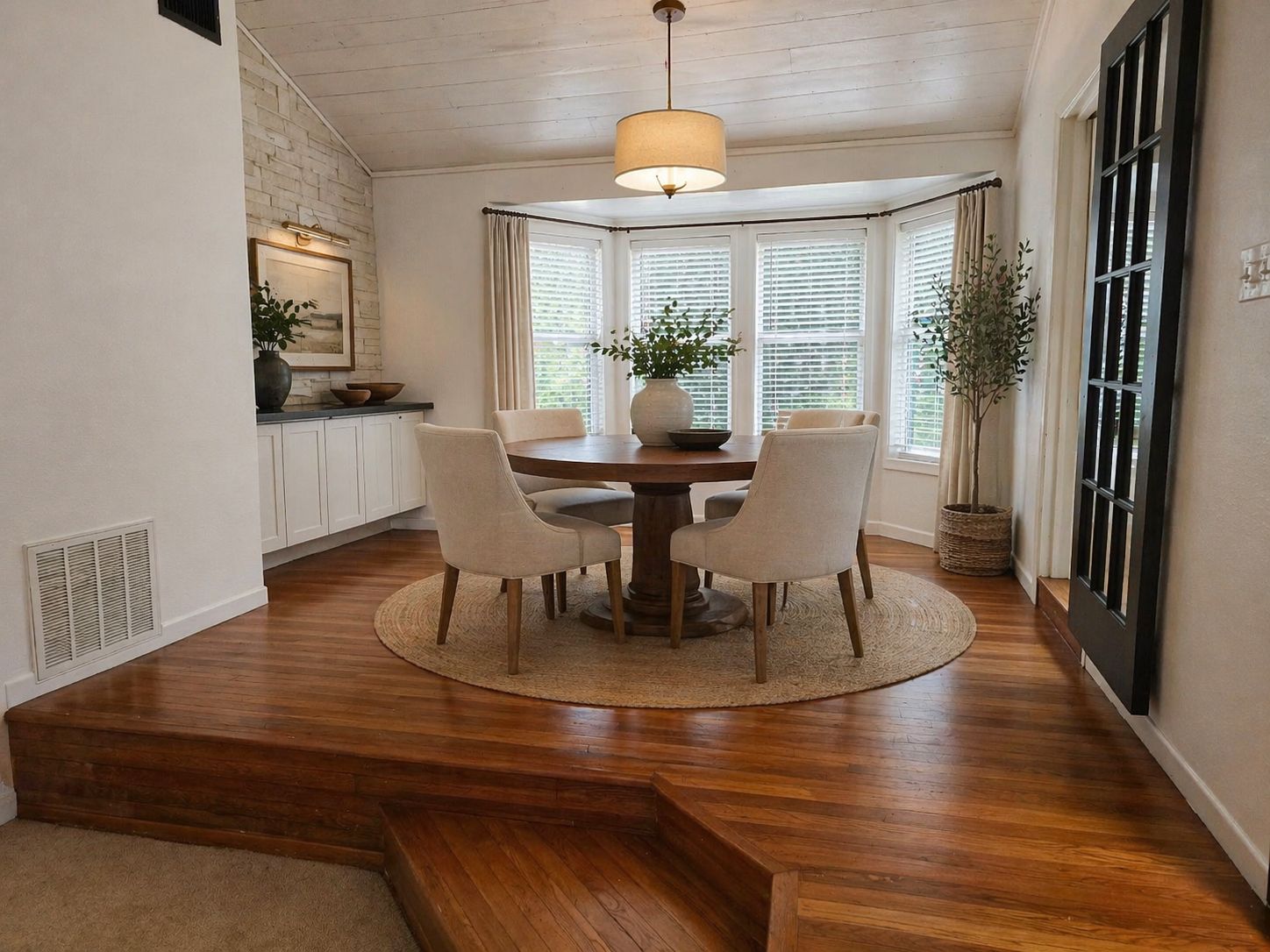 305 North 5th Street Thorndale, TX 76577 - Photo 7 of 20 a view of a dining room with furniture window and wooden floor