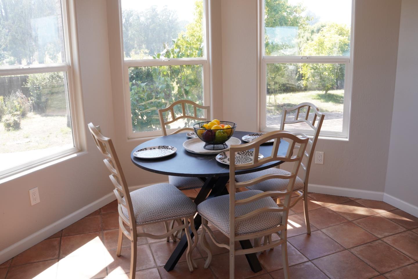 389 Corralitos Road Watsonville, CA 95076 - Photo 7 of 18 a view of a dining room with furniture window and outside view