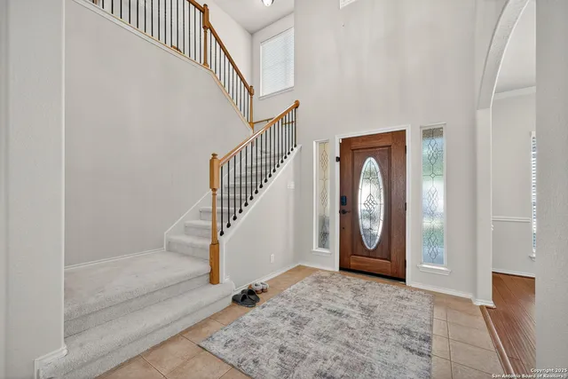 a view of an entryway with staircase