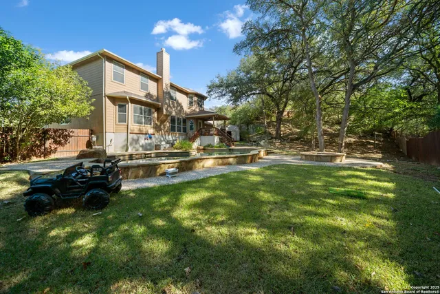 a view of a house with a swimming pool