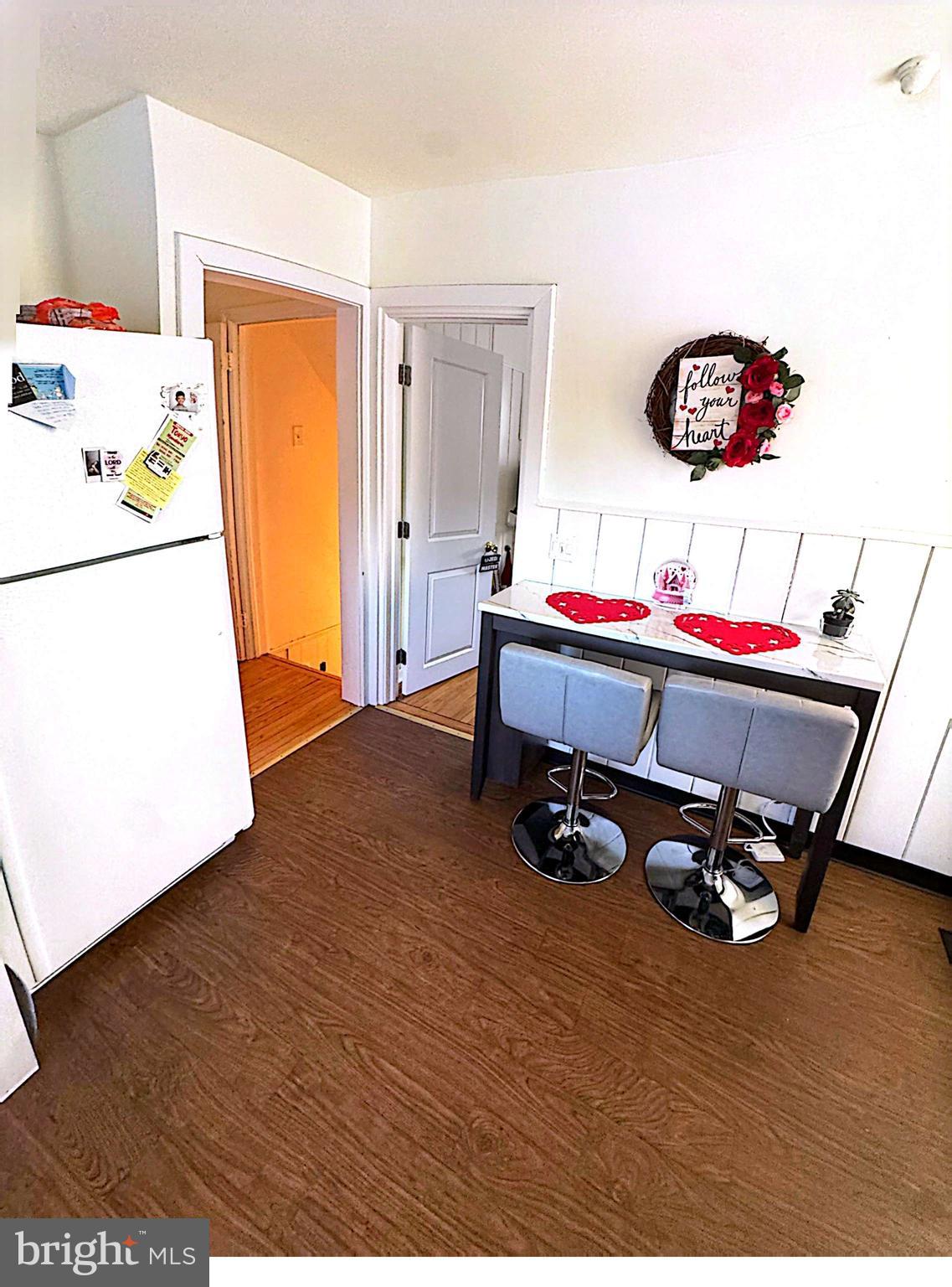 409 Swarthmore Road Glassboro, NJ 08028 - Photo 4 of 14 a room with a bed and a table