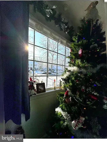 a view of living room filled with furniture and a couch