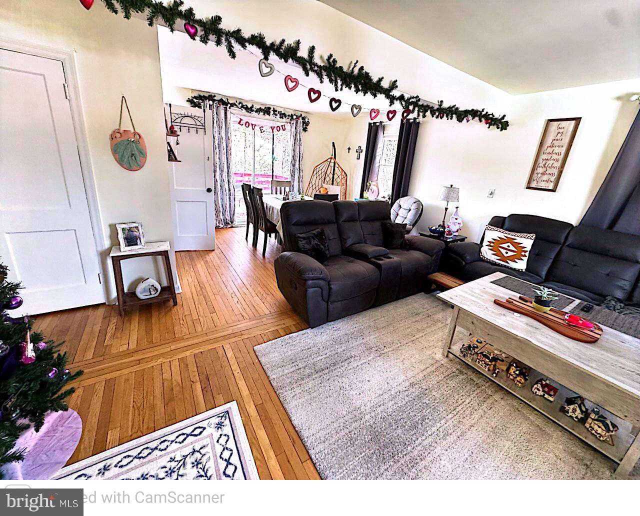 409 Swarthmore Road Glassboro, NJ 08028 - Photo 6 of 14 a living room with furniture and a rug