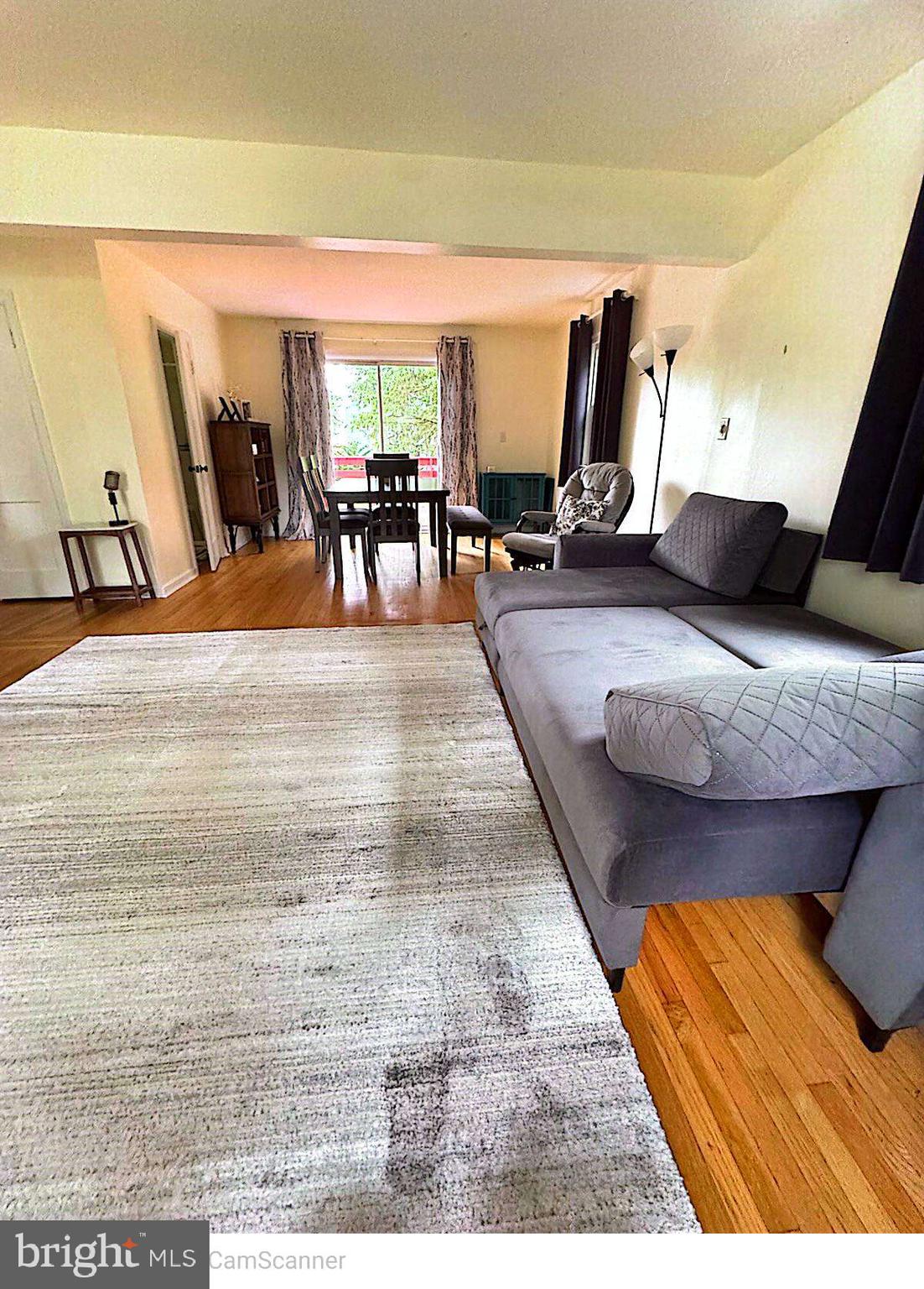 409 Swarthmore Road Glassboro, NJ 08028 - Photo 7 of 14 a view of living room filled with furniture and a couch