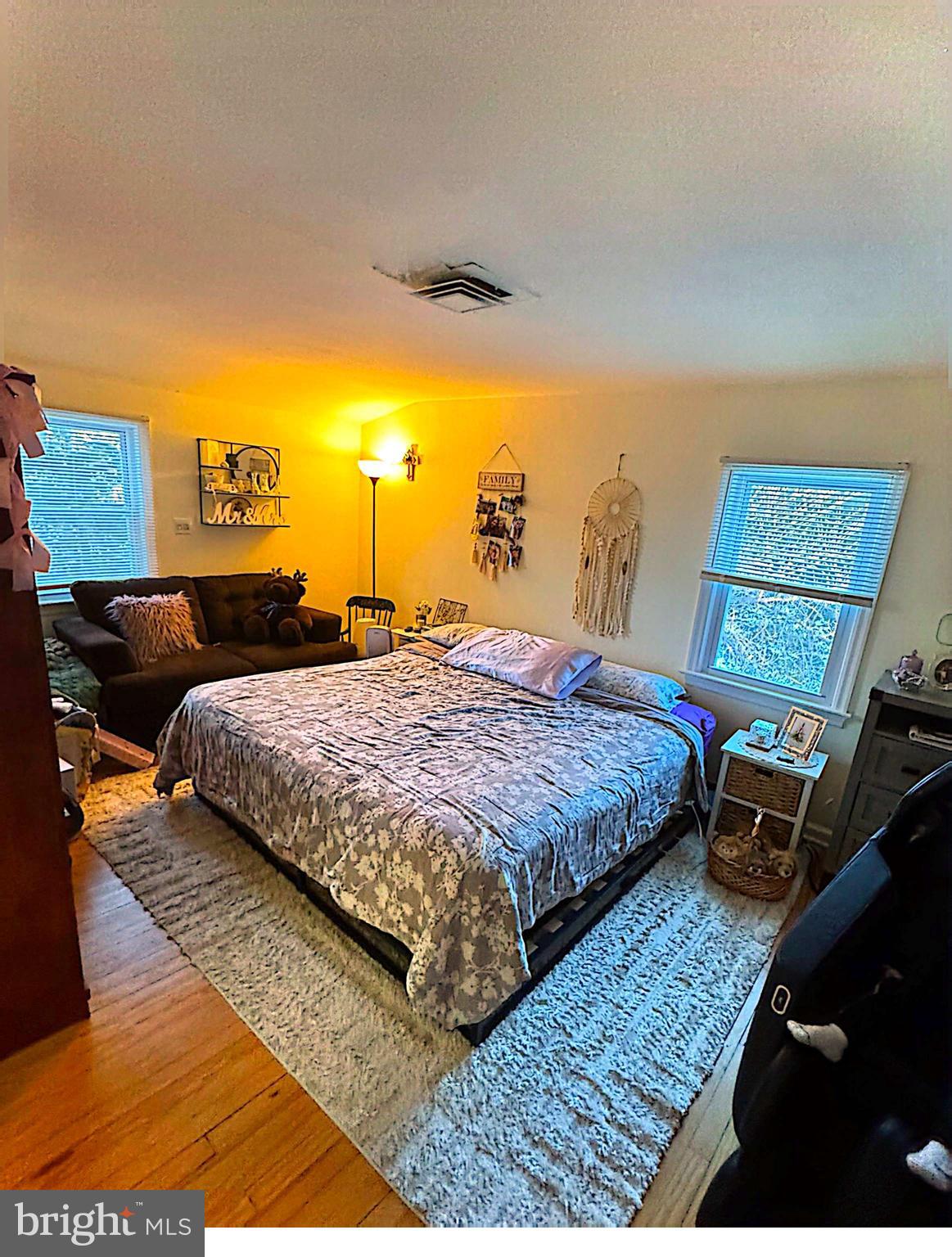 409 Swarthmore Road Glassboro, NJ 08028 - Photo 9 of 14 a bedroom with a bed and a night stand