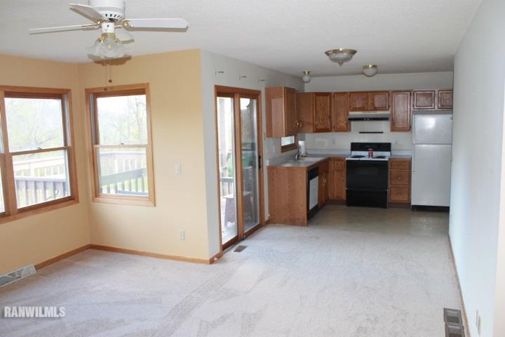 122 North Brodrecht Road Galena, IL 61036 - Photo 5 of 23 a view of a kitchen with a stove cabinets and a kitchen