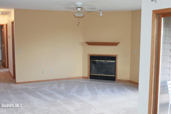122 North Brodrecht Road Galena, IL 61036 - Photo 7 of 23 a view of an empty room with a fireplace