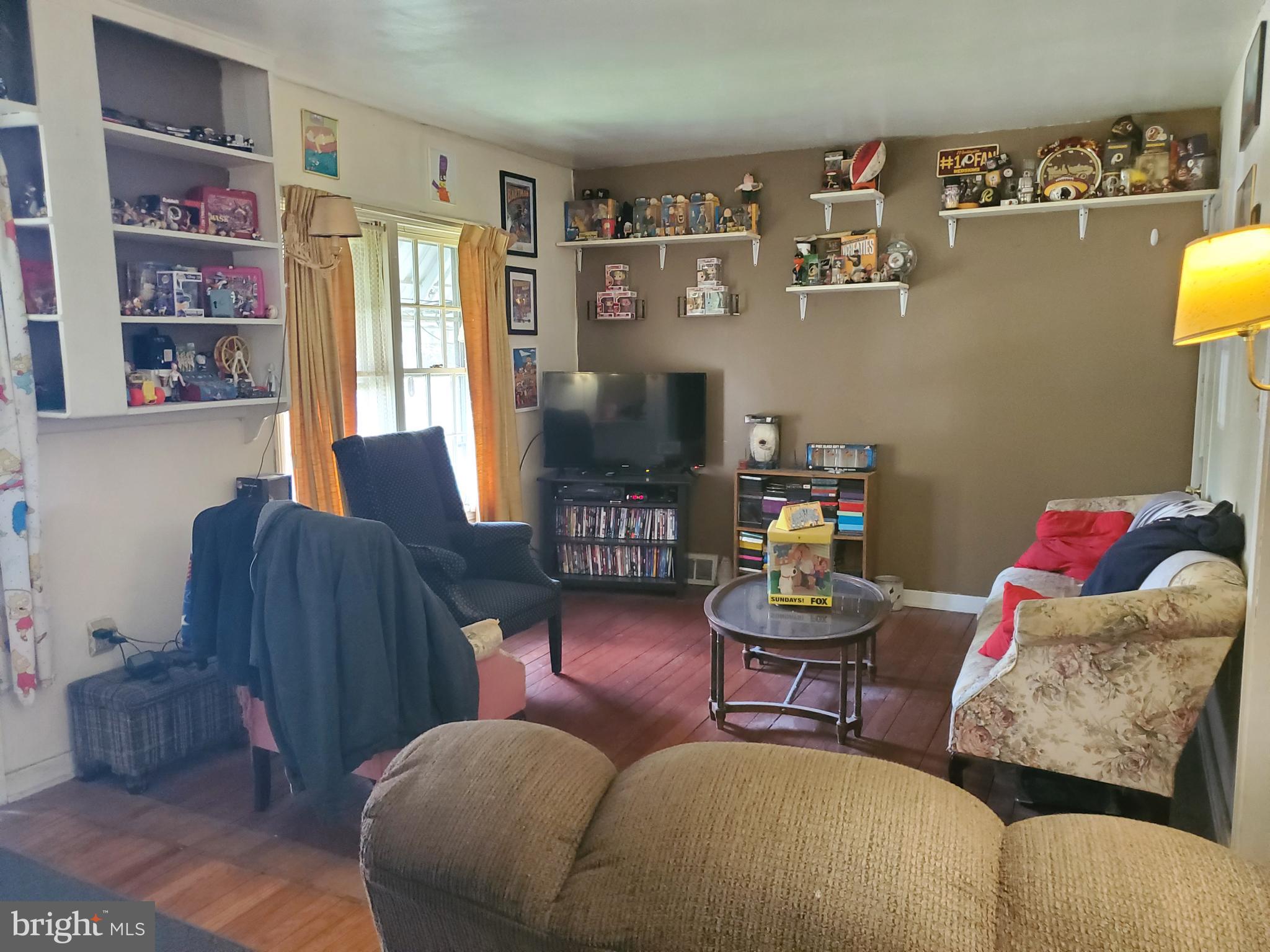 2638 Fairview Avenue Reading, PA 19606 - Photo 12 of 24 a living room with furniture and a couch