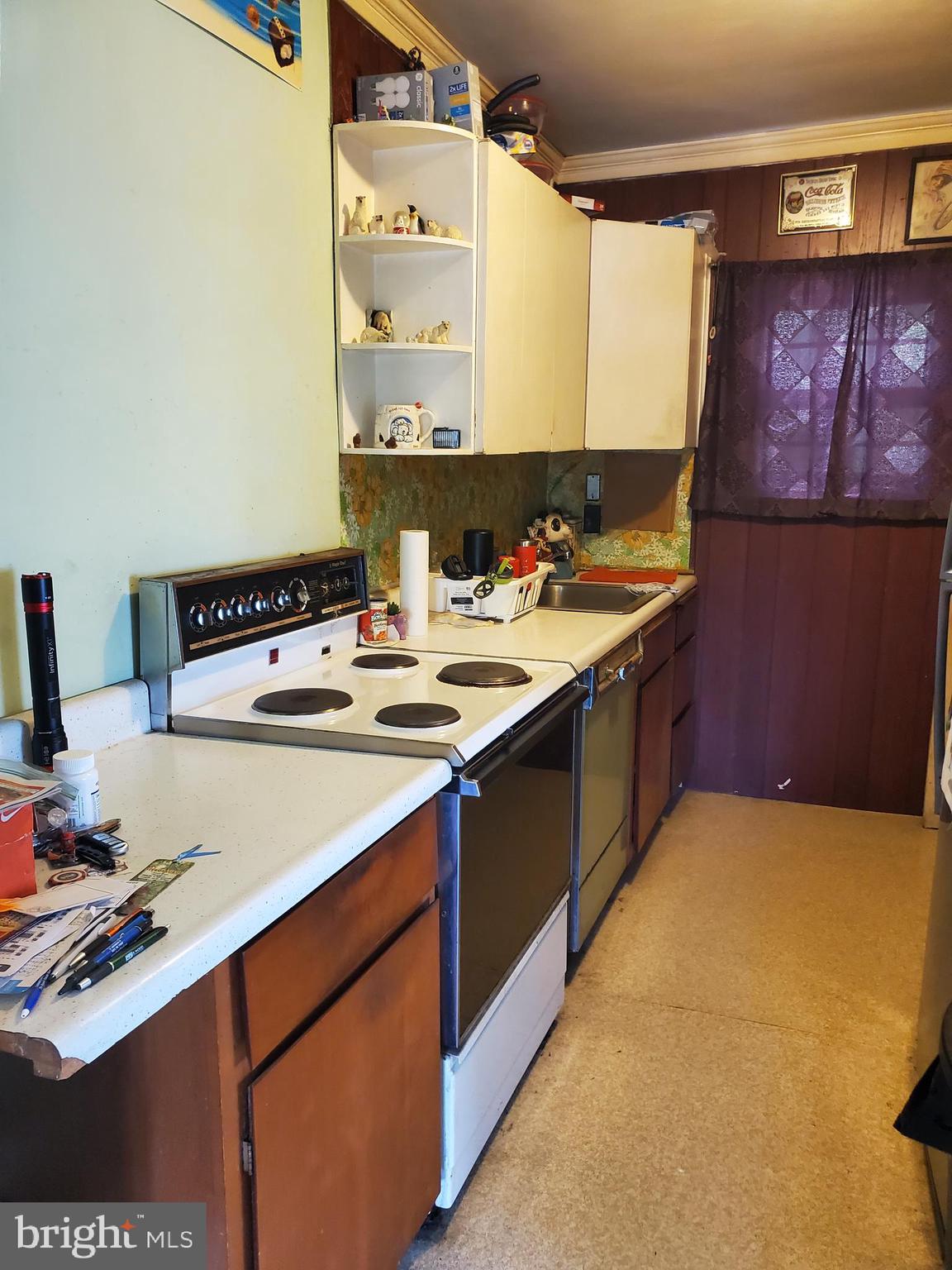 2638 Fairview Avenue Reading, PA 19606 - Photo 16 of 24 a kitchen with a stove a sink and a microwave