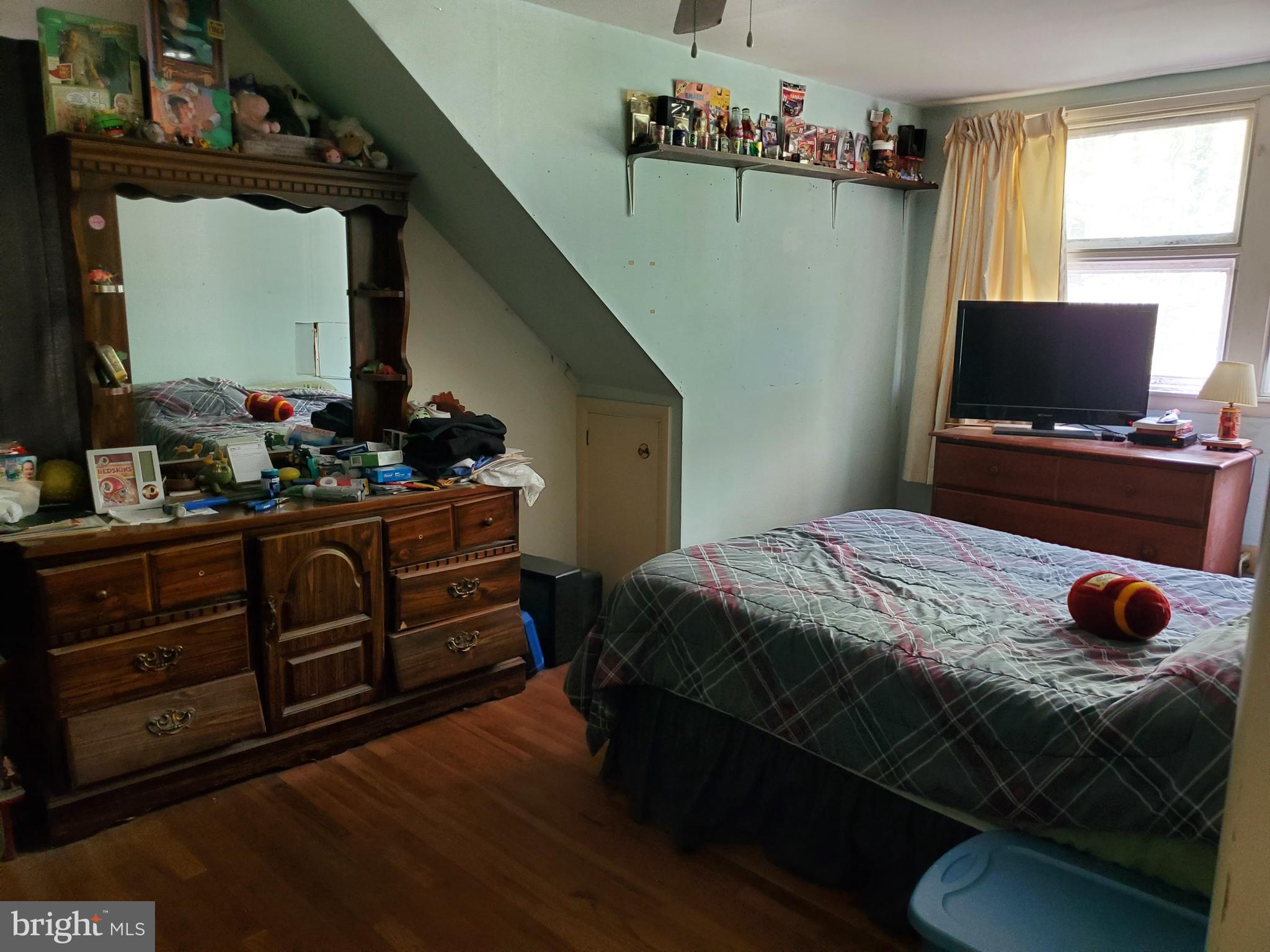 2638 Fairview Avenue Reading, PA 19606 - Photo 21 of 24 a bedroom with a bed and a flat screen tv