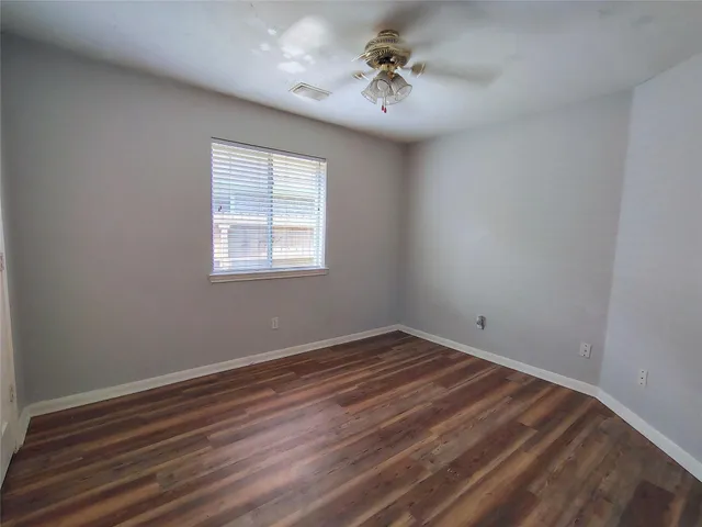 a view of a room with a window