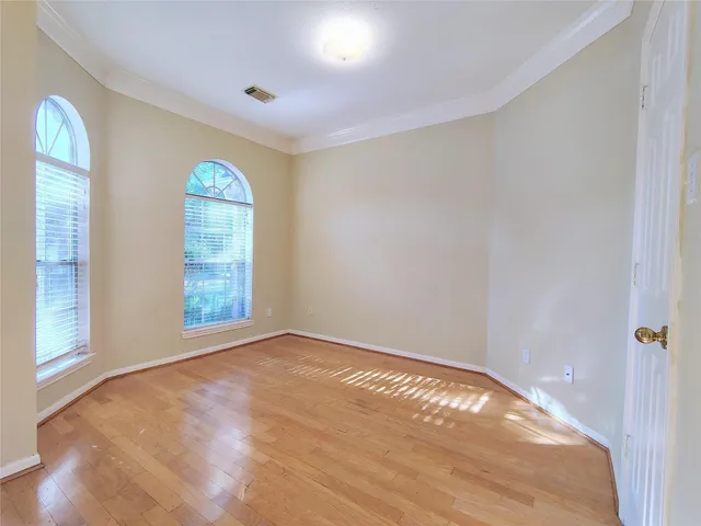 an empty room with windows