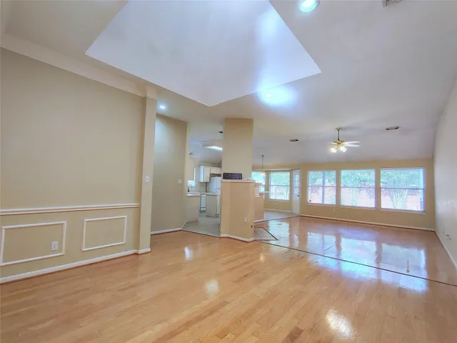 a view of a kitchen with a sink and a window