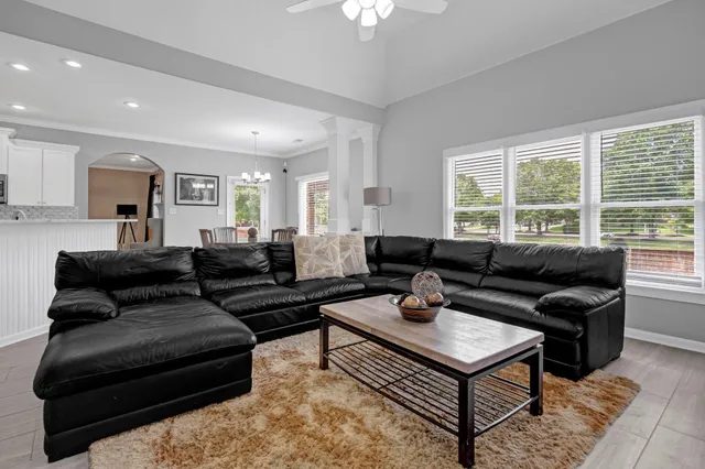 a kitchen with granite countertop cabinets stainless steel appliances and a counter space