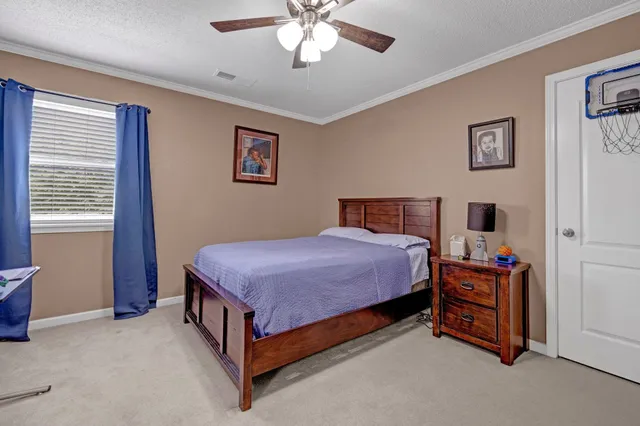 a bathroom with double vanity sinks and a mirror