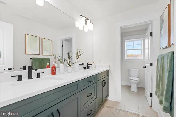 a bath tub sitting next to a shower