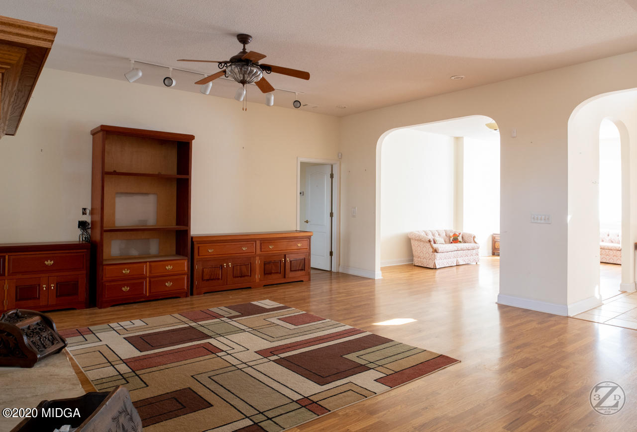 519 Doerun Road Doerun, GA 31744 - Photo 22 of 81 a living room with furniture and wooden floor