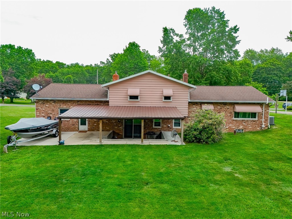 5862 Canterbury Road New Franklin, OH 44319 - Photo 36 of 45 Patio area covered and boat slip to left