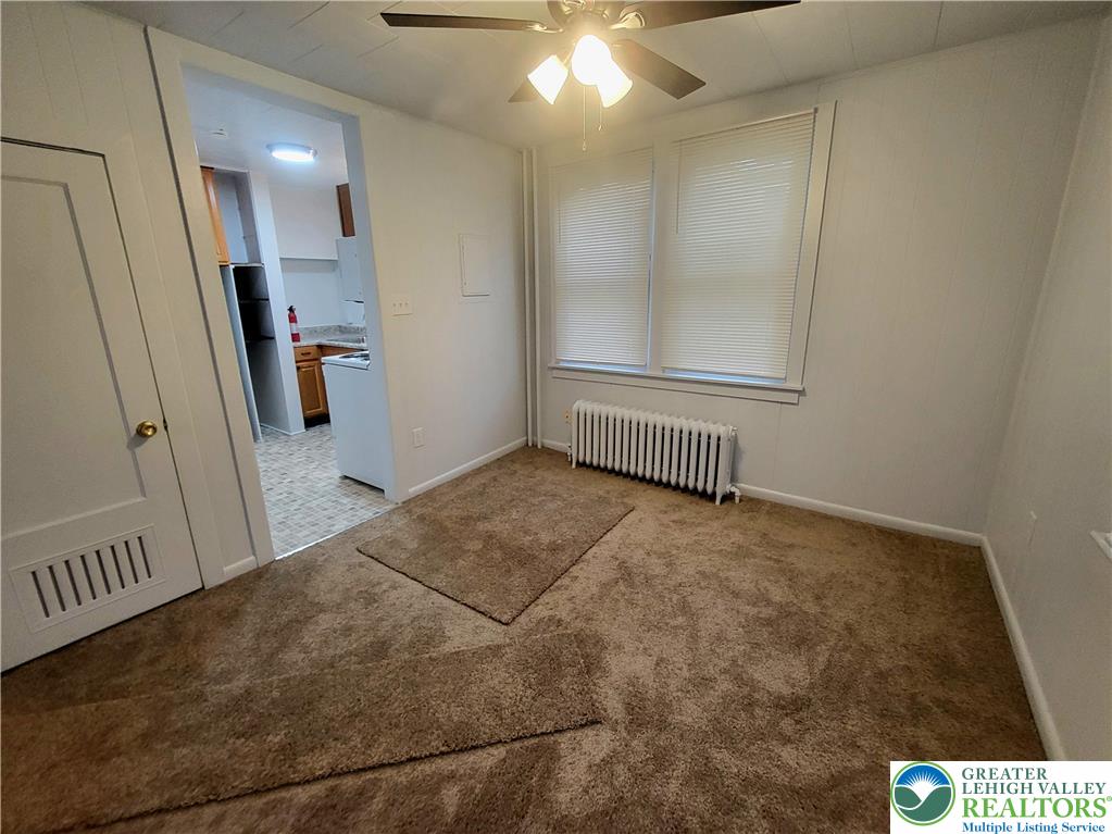 817 Seneca Street, Unit B Fountain Hill, PA 18015 - Photo 7 of 12 a view of a livingroom with a staircase