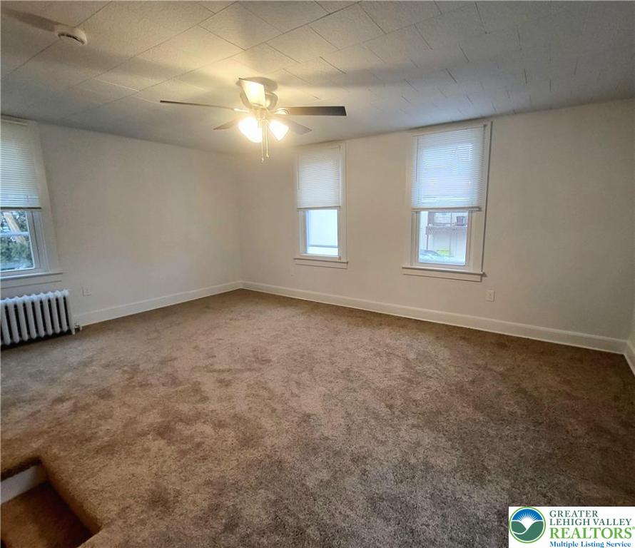 817 Seneca Street, Unit B Fountain Hill, PA 18015 - Photo 10 of 12 a view of an empty room with a window
