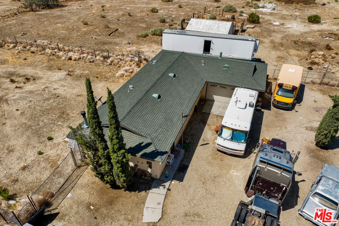 36901 165th Street East Llano, CA 93544 - Photo 4 of 18 an aerial view of residential houses with outdoor space