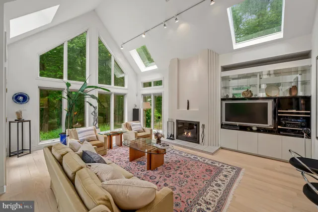 a bathroom with a double vanity sink and a large mirror